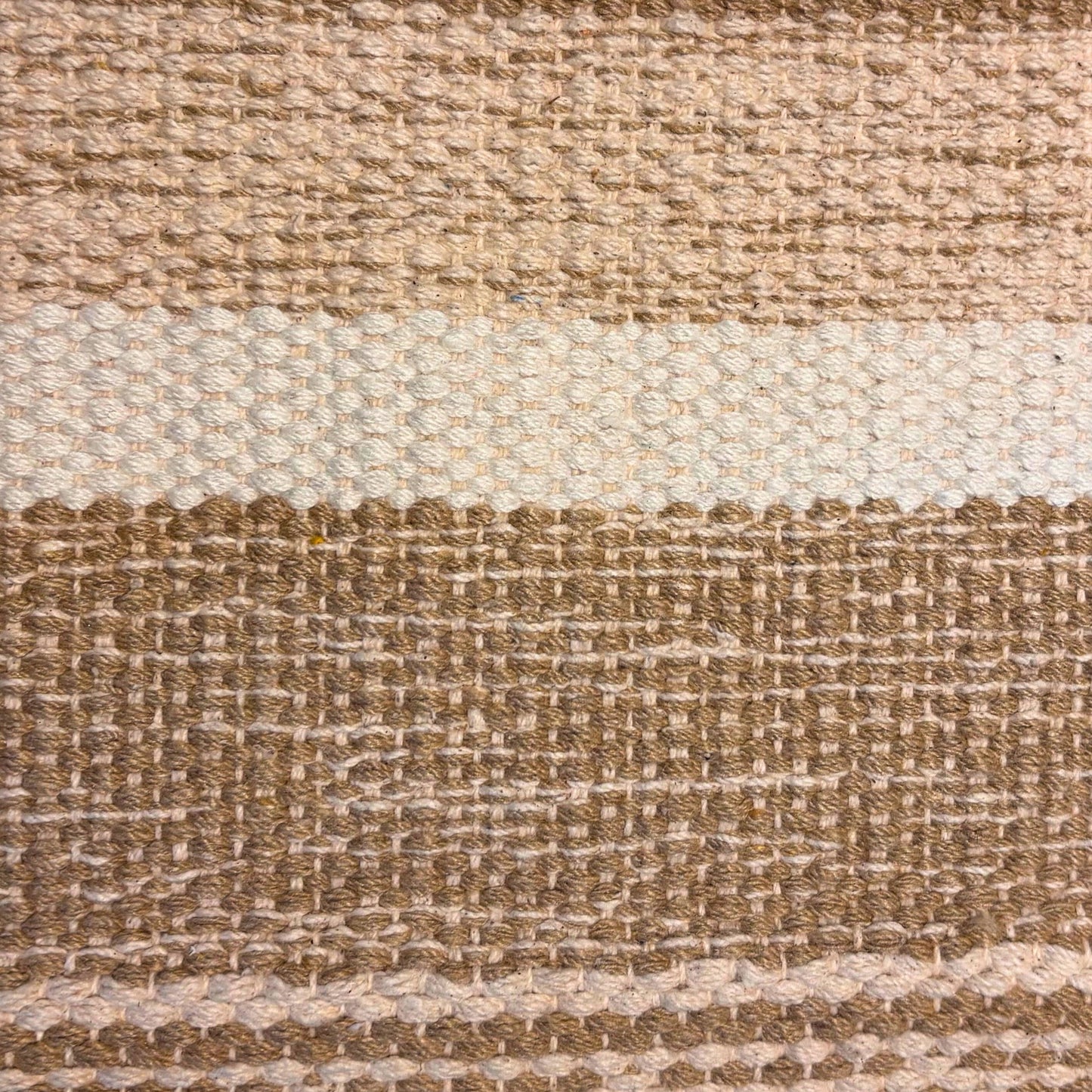 Textured fabric with brown and beige stripes